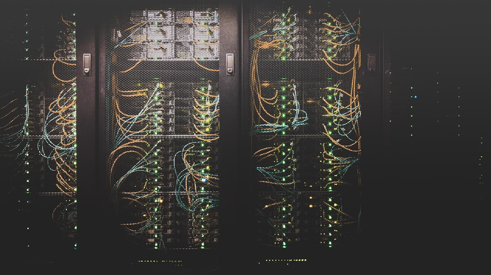 Server rack lit by cool blue lights, suggesting reliable cloud storage